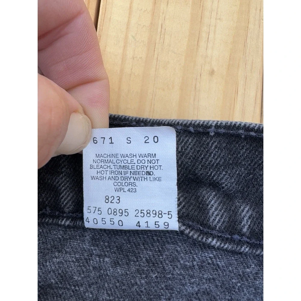Vintage Black Levi's 550 Relaxed Fit Tapered Leg Orange Tab 34x32